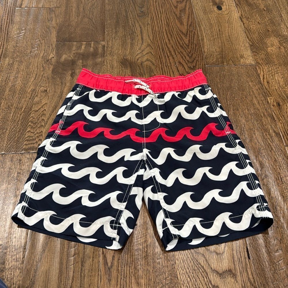 Gap kids swim trunks navy waves. Sz 6/7
